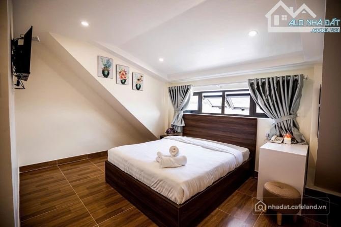 Bán nhà hàng - Khách sạn: KHÁCH SẠN 13 phòng KD mt KQH chỉnh chu 110m2 SRXD hơn
