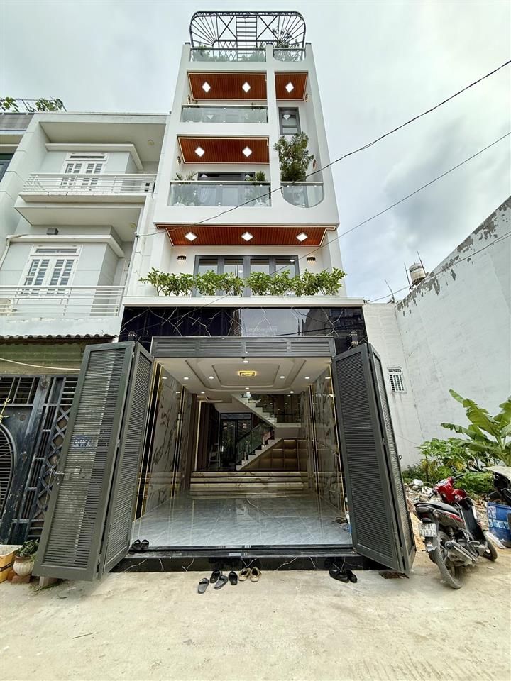 Nhà thạnh lộc 19, dt 4,5x14m, lửng, 3 lầu, 4pn, gara ô tô, sân thượng, hướng đông nam, 6,5 tỷ