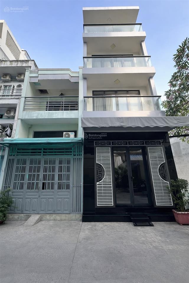 Vòng xoay lê đại hành ô tô 8m tránh ngang 4,5m 4 tầng không lộ giới nhà đẹp hiện đại