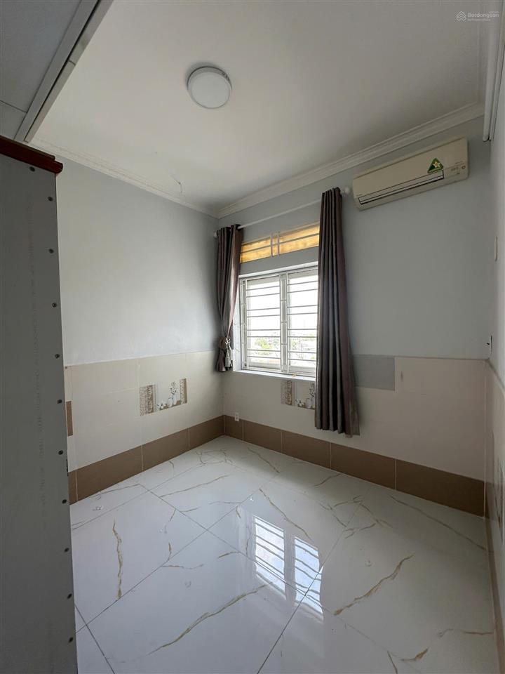 Chính chủ bán căn hộ 8x plus đường trường chinh quận 12 (cũ) 64m2, 2 phòng ngủ có sổ hồng giá tốt