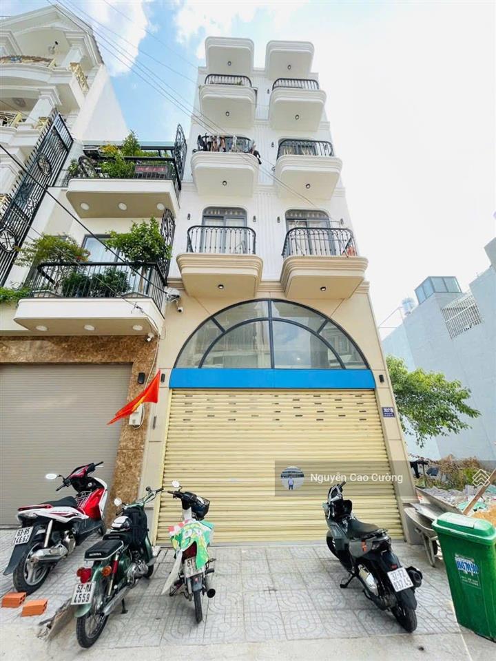 Bán ch dịch vụ thang máy 5x20m 1 hầm 4 lầu 12 phòng có thang máy đường 8m trần thị hè, hiệp thành