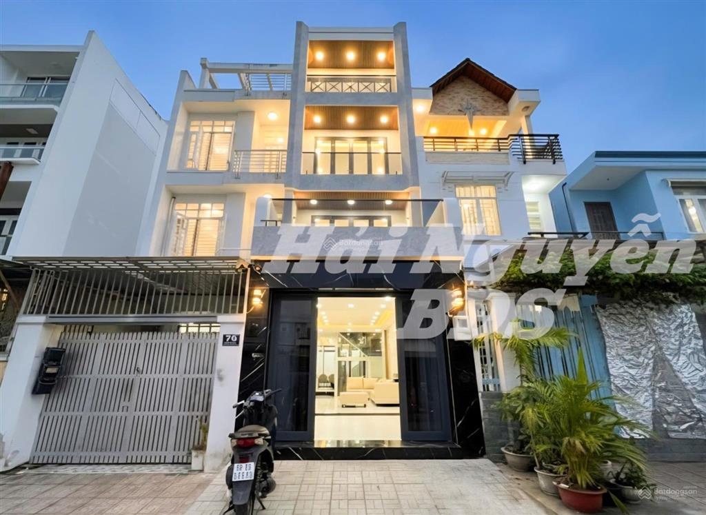 Nhà 4 tầng có thang máy, mặt tiền đường số, tân quy q7