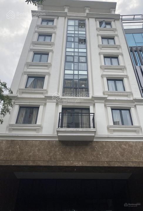 Bán tòa nhà 9 tầng văn phòng mặt phố giảng võ 169 m2 vỉa hè rộng giá chỉ 109 tỷ