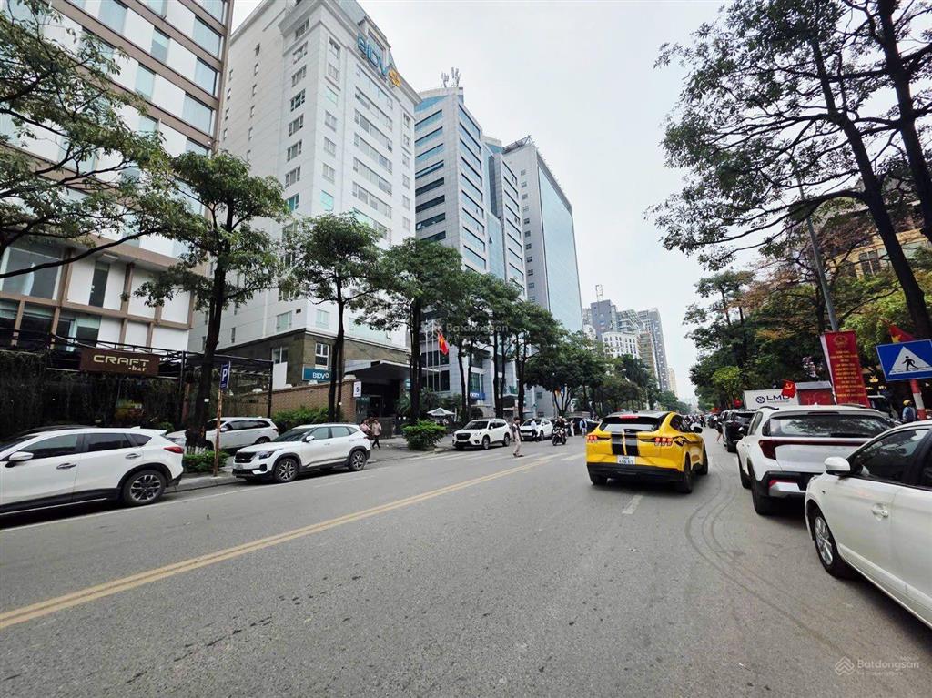 Tòa khách sạn mặt phố trần quốc vượng 145m*8t mt10m 70 tỷ lô góc, vỉa hè, ôtô doanh thu 180tr/th