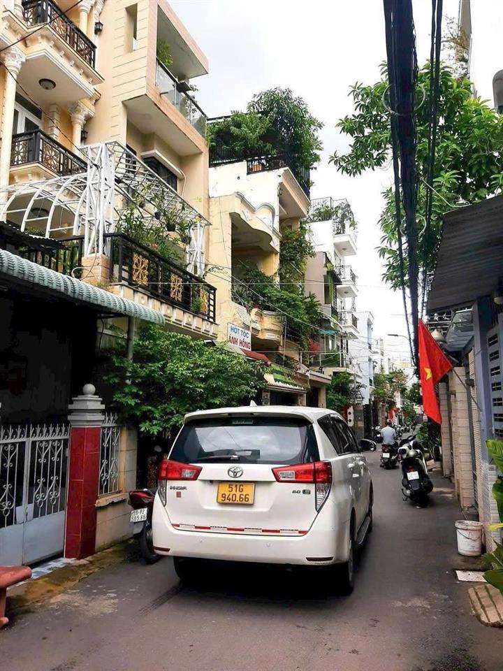 Hẻm xe hơi thông lê đức thọ nhà 2 tầng cứng cáp rộng rãi