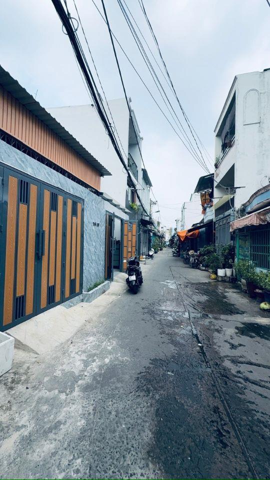 Nhà sát đường Tân Hoà Đông (dtsd 69m) hẻm xe hơi , pháp lý chuẩn shr 4₫ nhỉnh