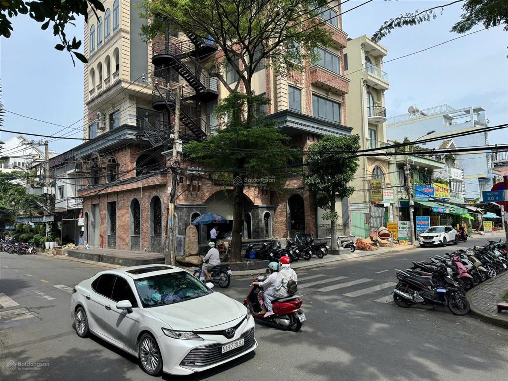 Bán tòa nhà hầm + 8 tầng dt 13,5mx20m góc 2 mt đường số 7, quận 7 hđt 180 triệu/th giá 73 tỷ