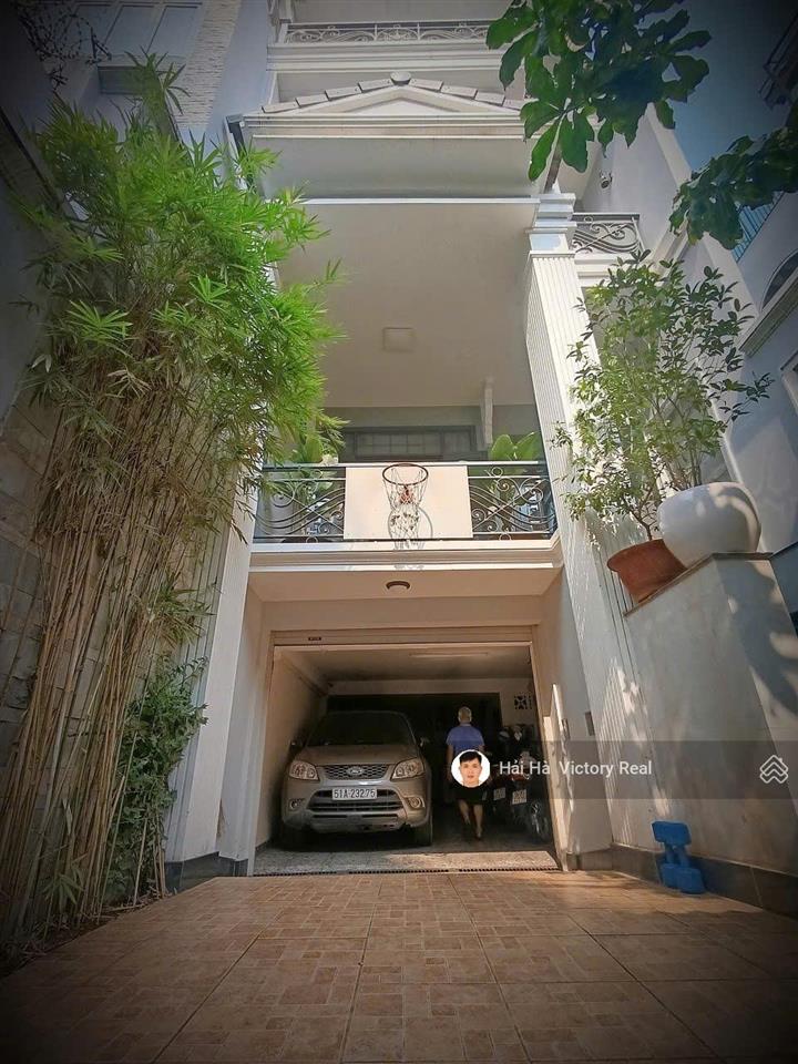Bán nhà hxh 6m đường cửu long, khu sân bay dt5x21m nhà đẹp hầm 3 lầu, phù hợp ở và làm văn phòng