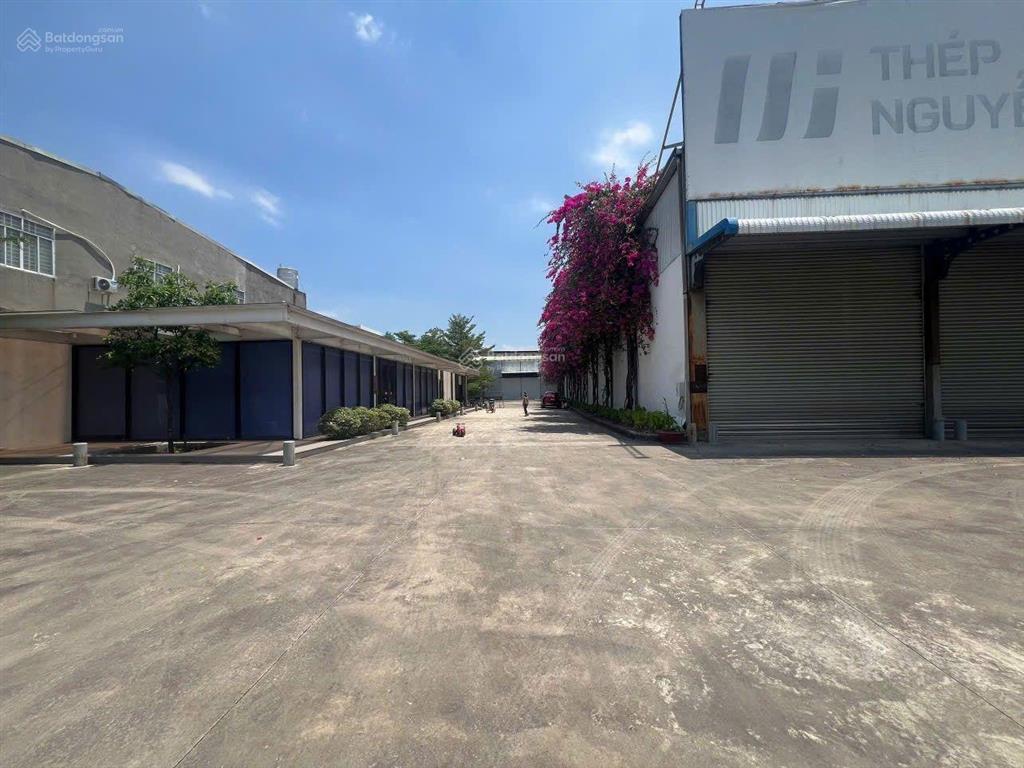 Bán 6100m mặt tiền ql51 p.phú mỹ, có sẵn kho xưởng. thích hợp làm showroom.