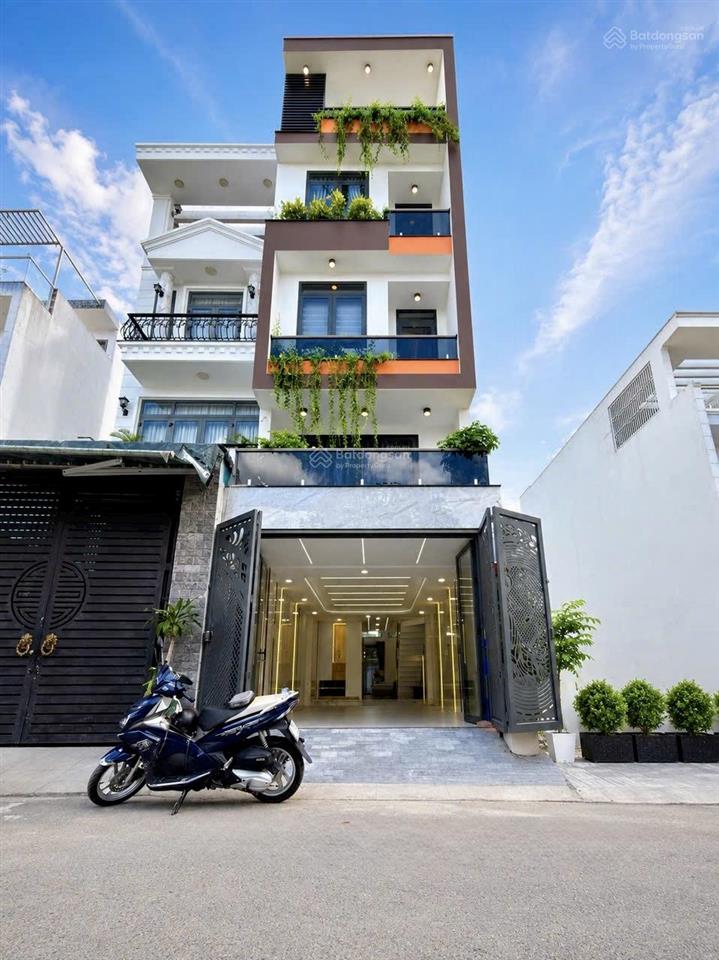Nhà có thang máy đường thông thạnh lộc 15, dt 4x20m, lửng, 3 lầu, 4pn, p.thờ, s.thượng, hướng tnam