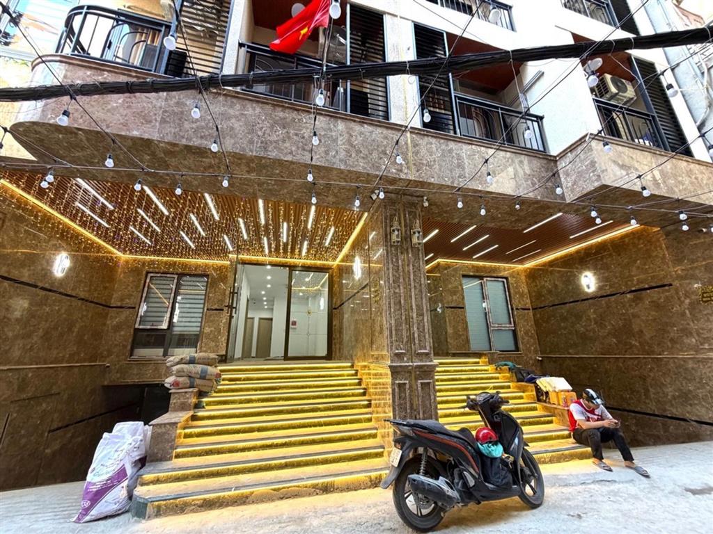 Toà nhà 155m² 8 tầng mt 6.4m 24 căn hộ cao cấp, 220tr/tháng. ngõ ô tô tránh, gần đsq mỹ chỉ 58.5 tỷ