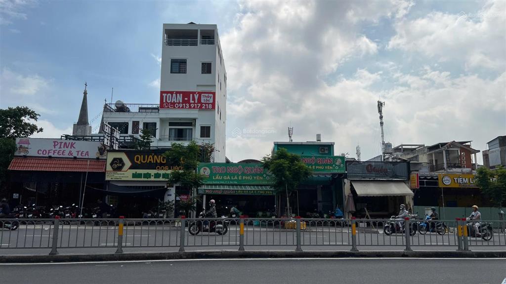 Ngộp bank ! bán gấp nhà mt dương quảng hàm,p.5,gv. dt 170m2 (6,5x27m) hầm + 7 tầng giá 25 tỷ