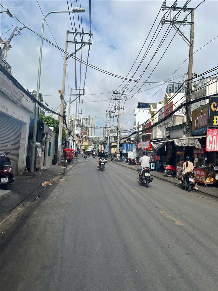 Bán nhà rợp bóng mát nguyễn thị thập q7 125\text{ m}^2 sân rộng, hẻm ô tô giá 14.15 tỷ