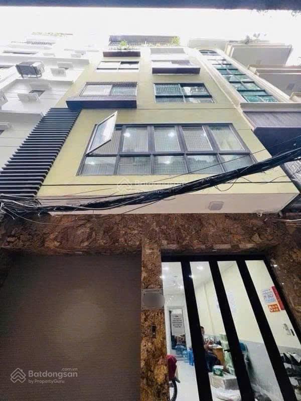 Nhà phân lô ô tô tránh 6 tầng thang máy kinh doanh đỉnh hàng xóm quận uỷ đống đa