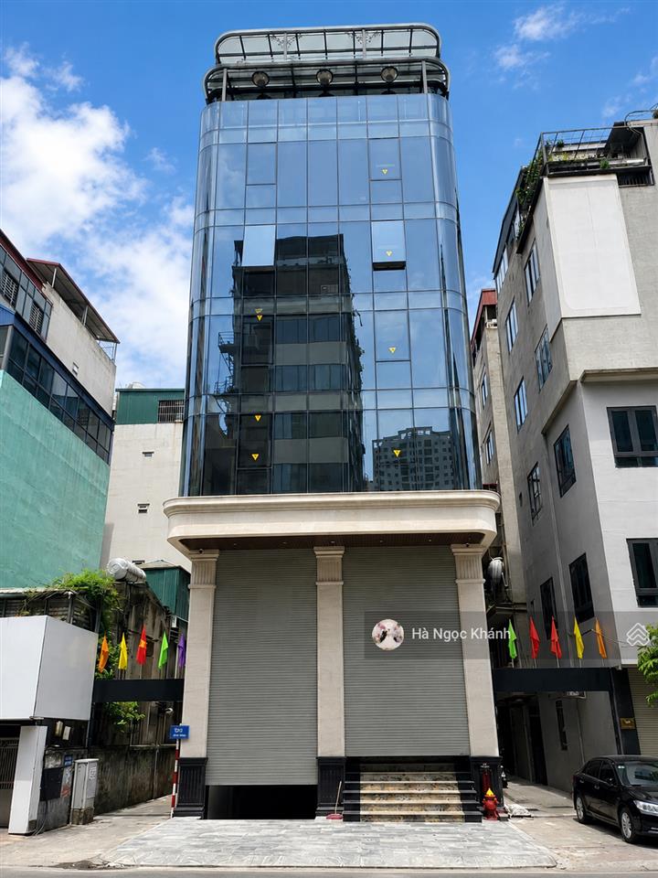 Mặt phố dương khuê building lô góc 8 tầng 75m vỉa hè kinh doanh ô tô dừng đỗ ngày đêm