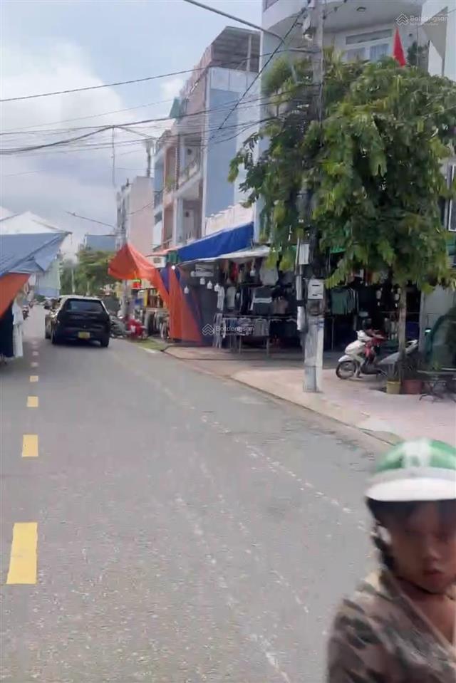 Bán đất tặng căn nhà mặt tiền chợ đêm tân an, 64m2, sổ sẵn