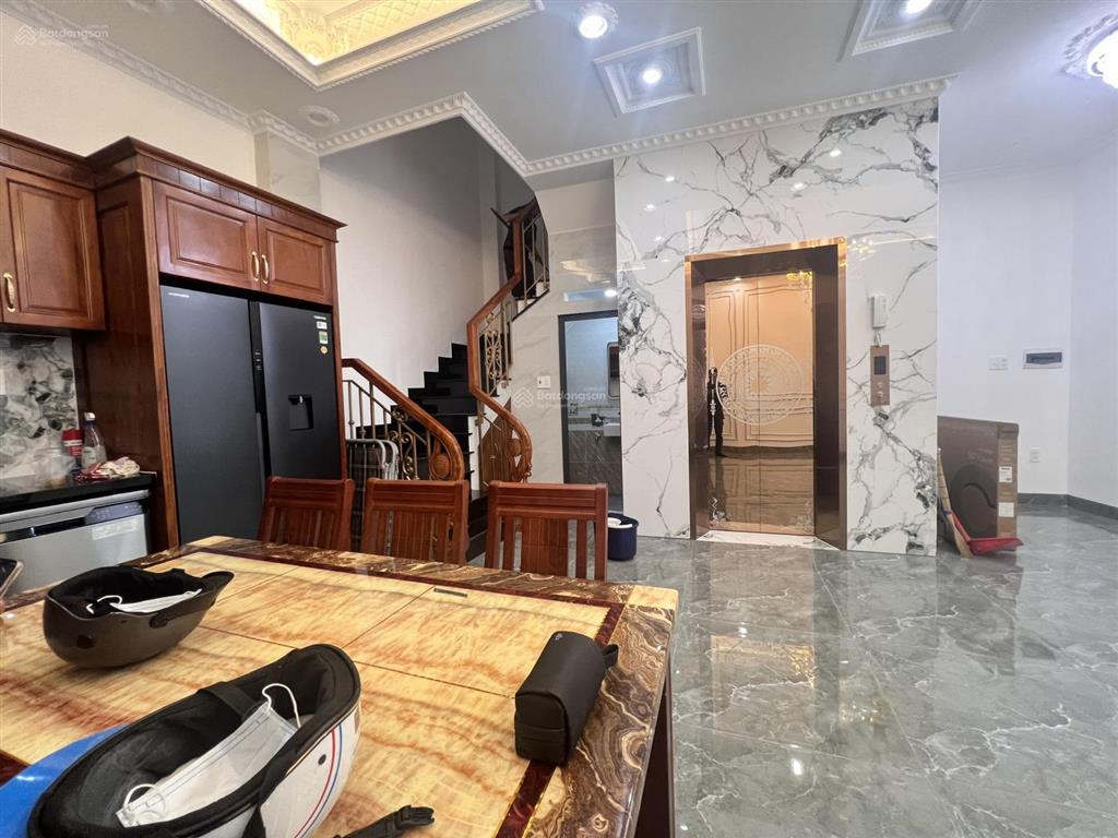 Nhà mới mt 56m2 ngang 7m, nhỉnh 15 tỷ 5 tầng full nội thất + thang máy ngay phan xích long