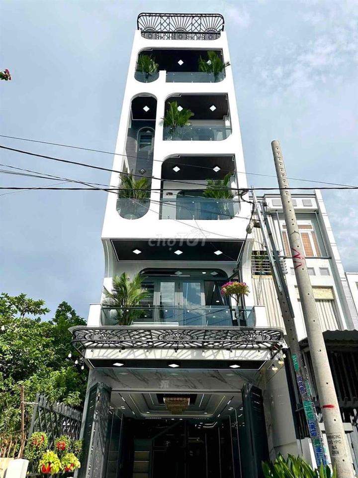 bán nhà mới trệt lửng 4 lầu, có thang máy phường trung mỹ tây