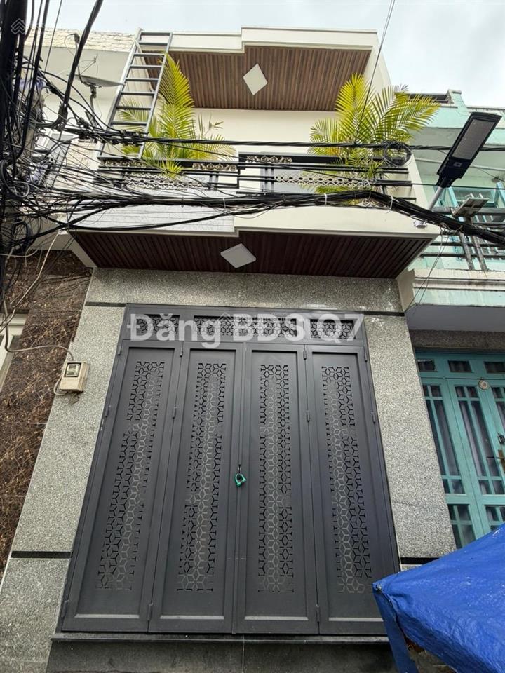 Quận 7 bán nhà mới 2 tầng 63m2 sàn full nội thất xe hơi tới cách nhà 50m giá 4.65 tỷ.