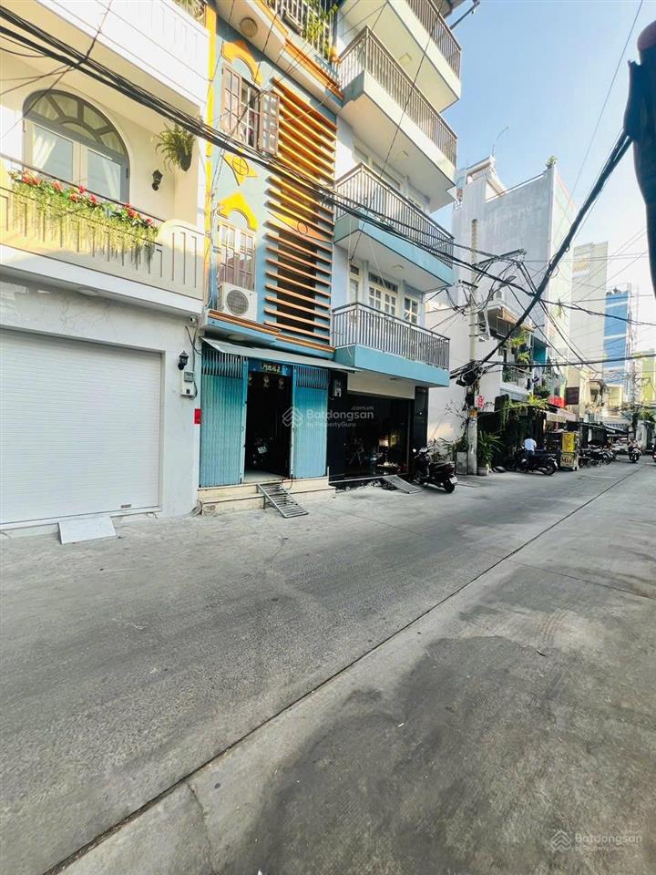 8 đồng căn góc 5 tầng không lộ giới quận 10. dòng tiền 32tr/ tháng. oto đậu trong nhà.