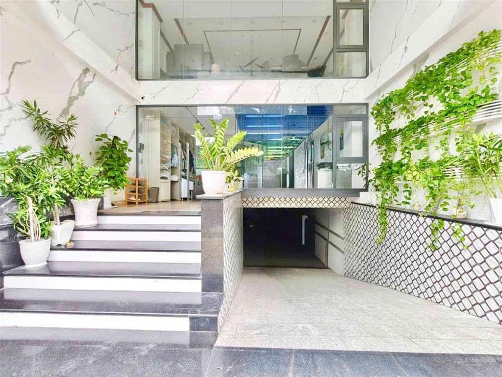 Tân phú mtkd đường lê niệm 7 tầng thang máy (6.1x19m) 7pn dòng tiền 50tr/th giá 23 tỷ
