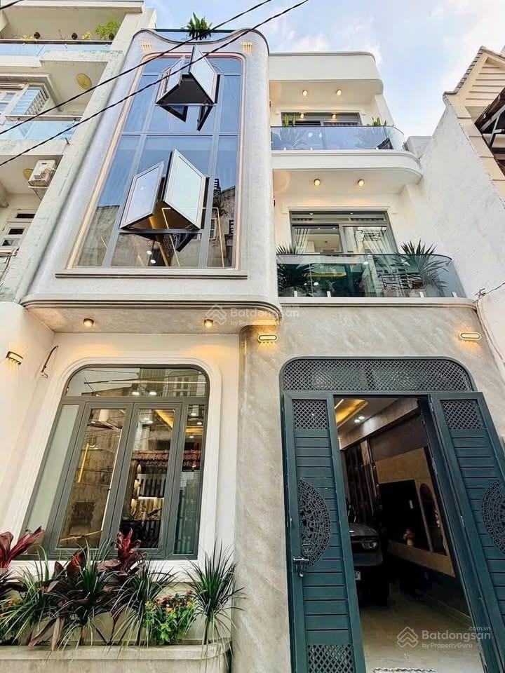 Nhà villa ngang 6m phạm văn bạch 4 tầng 5 phòng ngủ ô tô ngủ trong nhà nhỉnh 7 tỷ