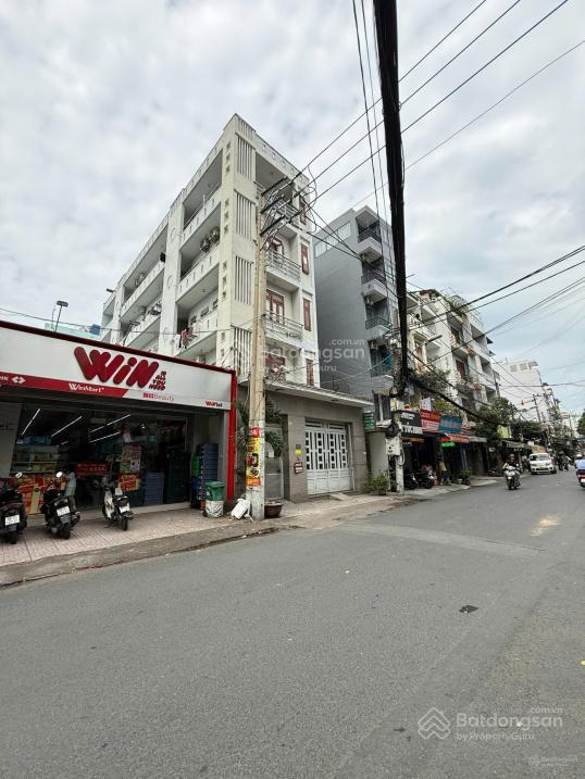 Cần bán gấp nhà mt nguyễn quang bích tân bình. dt 7x29m, 5 tầng. giá 22 tỷ tl.