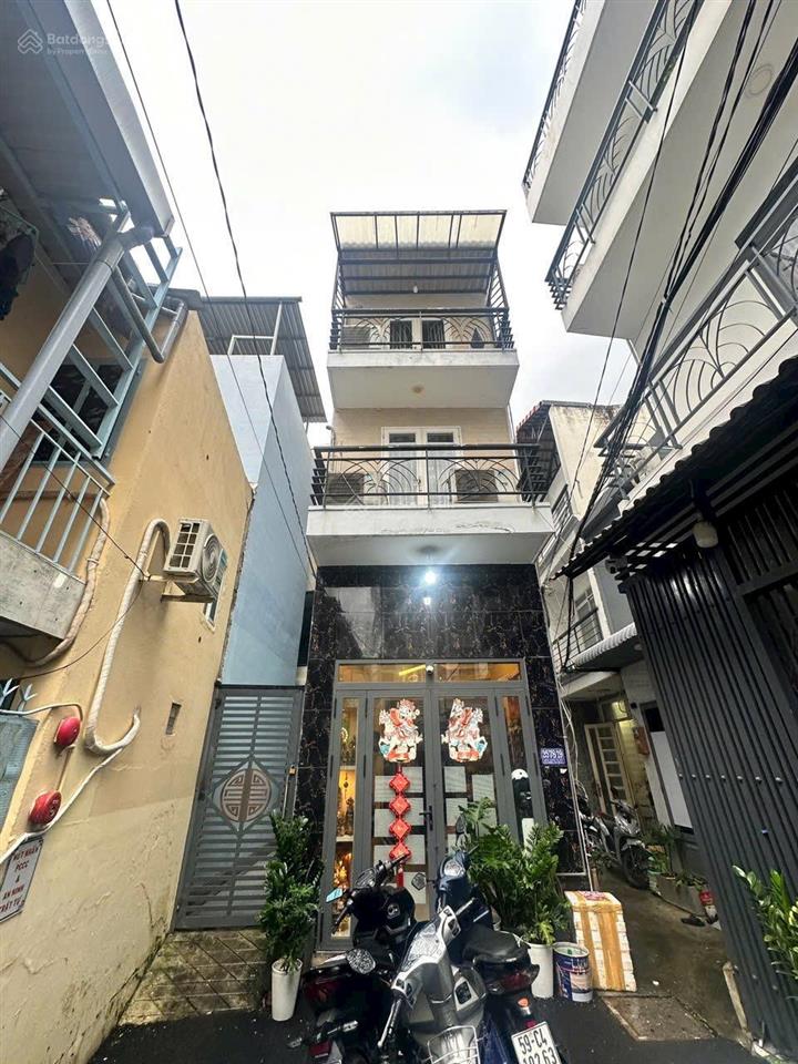 Bán nhà quận 7 3 tầng shr sát phú mỹ hưng và chợ tân mỹ dt 24m2 giá 3tỷ200tr. 0909 519 ***