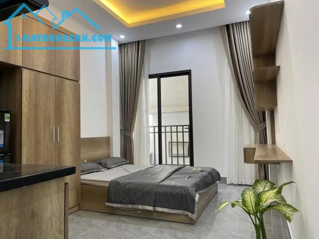 TÒA CHDV SÁT ĐH BÁCH KHOA 60M2 6 TẦNG 15PKK DOANH THU CAO, GIÁ 12 TỶ