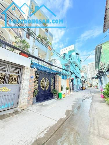 Nhà mới 4 tầng hẻm xe hơi thông Huỳnh Tấn Phát Phú Thuận Quận 7 - 61m2 (4x15) chỉ 9.2 tỷ