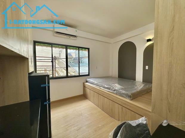 TÒA CHDV 2 MT HẺM Ô TÔ TÂN BÌNH - 6 TẦNG 15 PHÒNG THUÊ KHOÁN 70TR/THÁNG