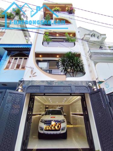 Nhà đẹp HXH thang máy Nguyễn Văn Khối P.Thông Tây Hội 5 tầng 80m2 giá 12.568 tỷ