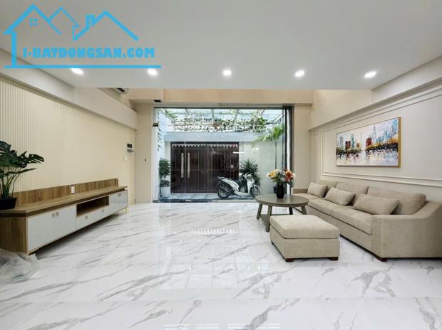 BÁN NHÀ ĐƯỜNG PHẠM VIẾT CHÁNH QUẬN 1, 5 TẦNG THANG MÁY