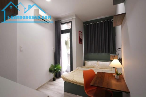 Gấp bán nhà 4 tầng, gần MT Hai Bà Trưng, Quận 1, thu nhập 70 tr/tháng.