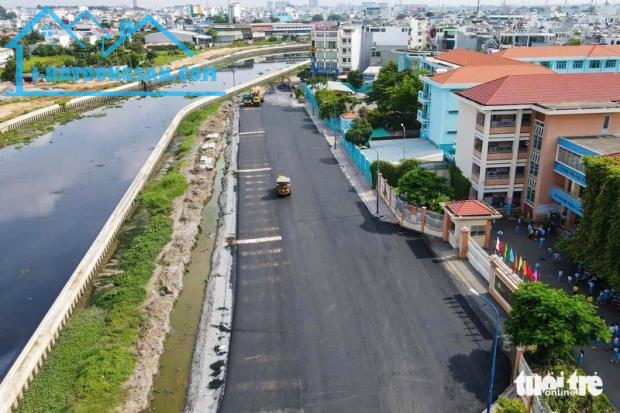 Nhà mặt tiền Tây Lân gần chợ, phù hợp vừa ở vừa kinh doanh.