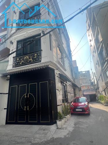 Hẻm xe hơi tránh - Đậu ngày đêm căn góc 4 tầng- 5pn Phú Nhuận 50m2 ngang 4m