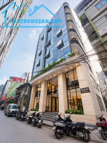 BÁN TÒA NHÀ VP ĐƯỜNG LÊ VĂN LƯƠNG. 110M2 - 9 TẦNG. THANG MÁY. LÔ GÓC.