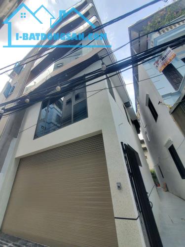 Bán nhà Ngọc Thuỵ,Long Biên 7 tầng,42m,mt5.8m oto vào nhà nhỉnh 13 tỷ