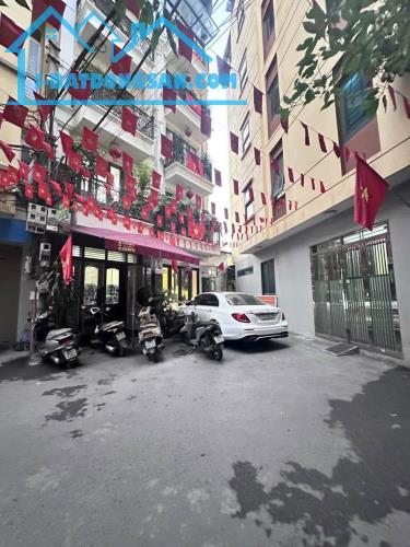 BÁN NHÀ ĐƯỜNG HOÀNG VĂN THÁI. 45M2 - 6 TẦNG. THANG MÁY. GARA Ô TÔ.