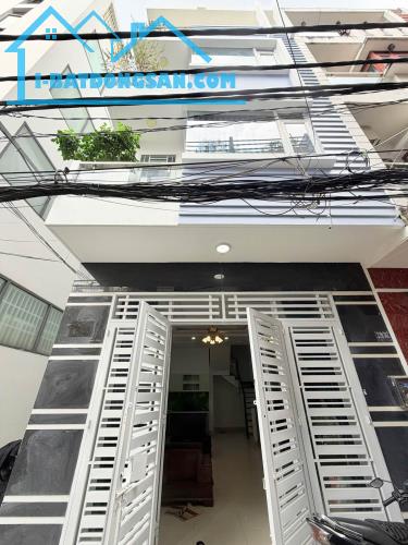 Bán gấp nhà mới đường Lê Văn Sỹ, phường Nhiêu Lộc, quận 3, 4 tầng, giá 12 tỷ,