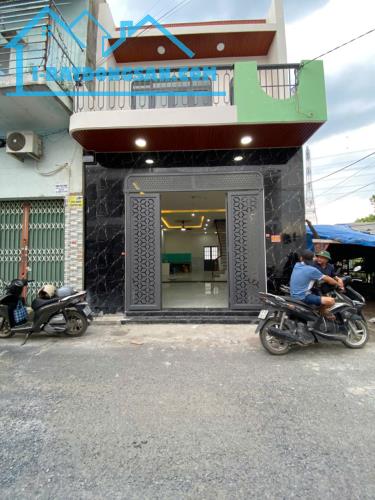 Bán nhà trệt lầu mặt tiền kinh doanh chợ Thạnh Phú gần công ty ChangShin